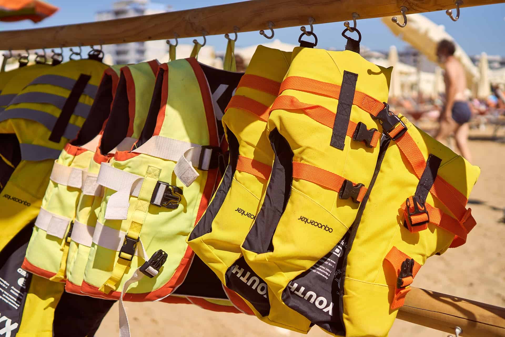 A selection of the Best Life Jackets hanging from a rail